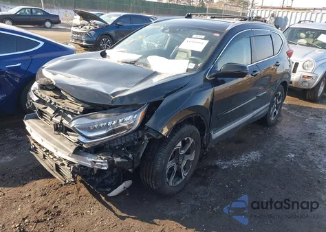 2017 Honda Cr-V Touring z USA, uszkodzony, nr VIN 2HKRW2H97HH630049